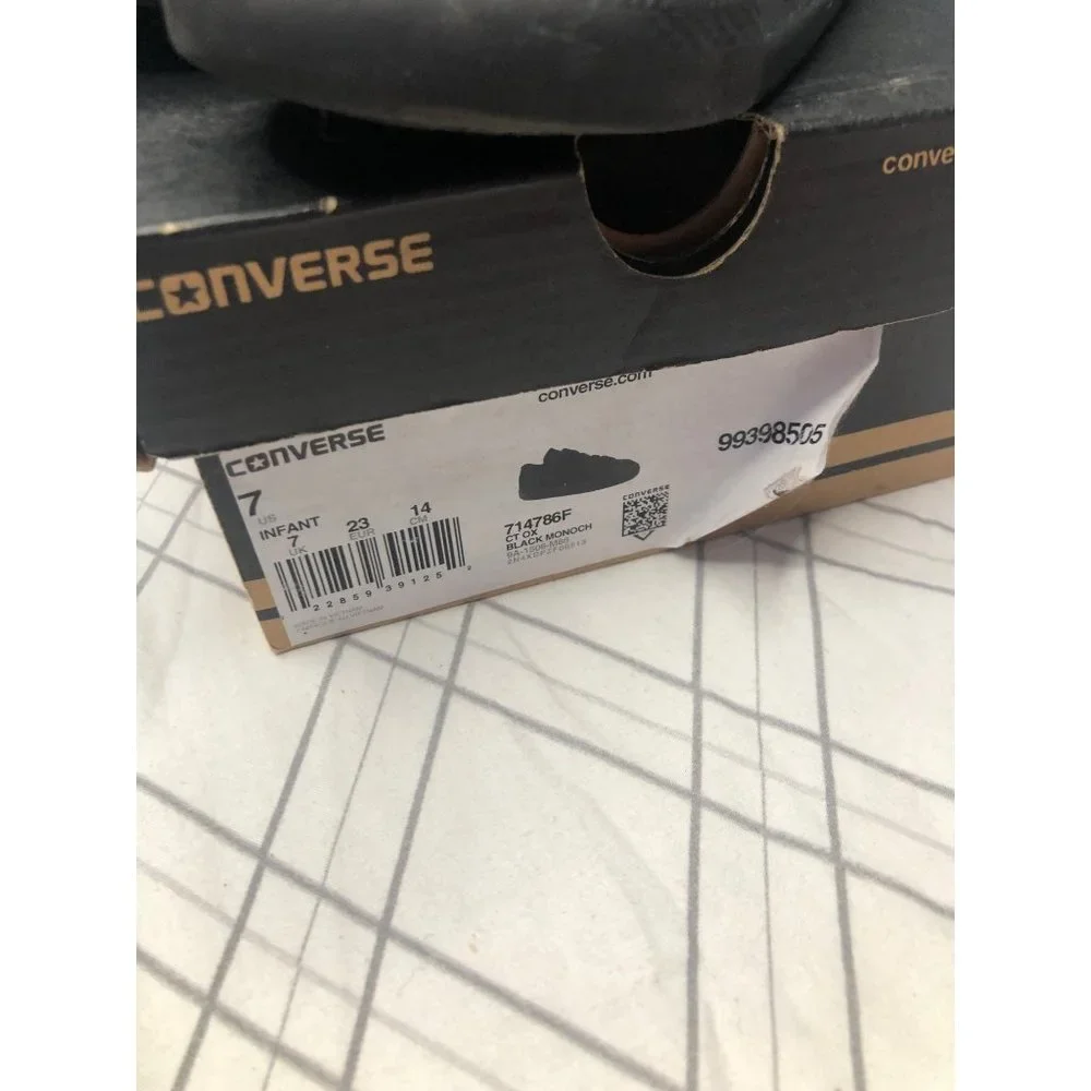 Converse black low top